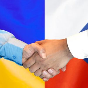 Business handshake on the background of two flags. Men handshake on the background of the Czech Republic and Ukraine flag. Support concept